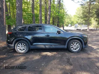 2016 Mazda CX-9 Sport with VIN JM3TCABY8G0112981, listed as a IAAI auction lot 42093389 with 106,384 mi miles. Bid and sale history available at carsss.com. Image 13.
