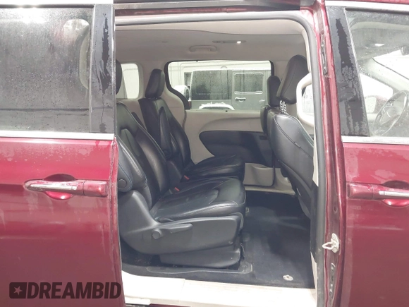2021 Chrysler Pacifica Hybrid Touring L with VIN 2C4RC1L71MR581260, listed as a IAAI auction lot 42014401 with 68,719 mi miles and . Bid and sale history available at DreamBid. Image 8.