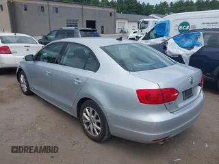 2013 Volkswagen Jetta SE with VIN 3VWDP7AJ6DM360709, listed as a IAAI auction lot 42656414 with 74,322 mi miles and . Bid and sale history available at DreamBid. Image 3.