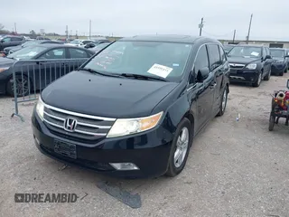 2013 Honda Odyssey Touring with VIN 5FNRL5H9XDB073706, listed as a IAAI auction lot 41591111 with 158,305 mi miles and . Bid and sale history available at carsss.com. Image 2.