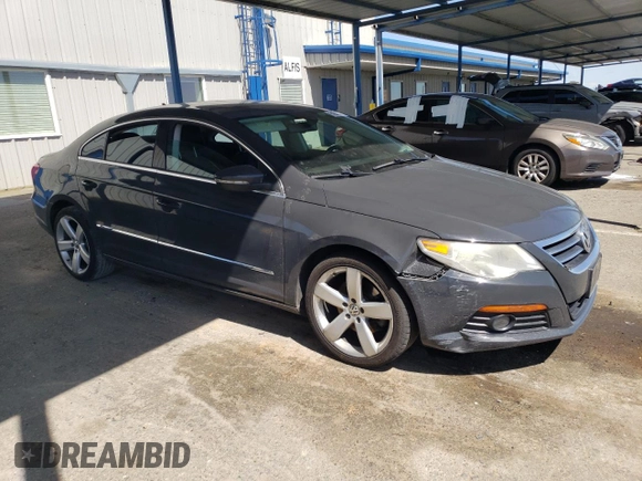 2012 Volkswagen CC Lux PZEV with VIN WVWHP7AN7CE505154, listed as a Copart auction lot 51849365 with 125,124 mi miles and Salvage Title. Bid and sale history available at carsss.com. Image 4.