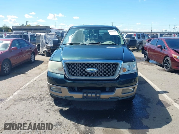 2004 Ford F-150 XL with VIN 1FTPX125X4NB31552, listed as a IAAI auction lot 41906943 with 256,688 mi miles. Bid and sale history available at carsss.com. Image 12.