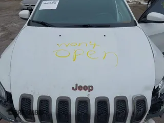2016 Jeep Cherokee Latitude with VIN 1C4PJMCB7GW268714, listed as a IAAI auction lot 41655450 with 180,603 mi miles. Bid and sale history available at carsss.com. Image 10.