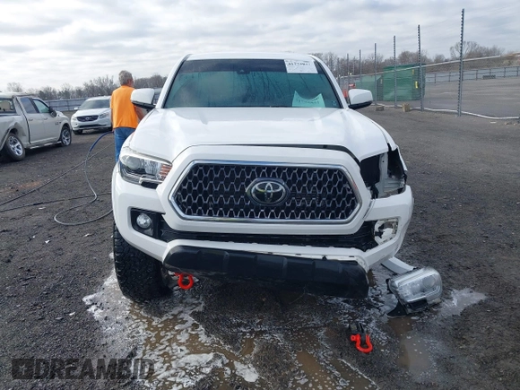 2019 Toyota Tacoma SR z VIN 3TMCZ5AN9KM284092, wystawiony jako IAAI lot #41774851 z przebiegiem 100 031 mil mil oraz . Historia ofert i sprzedaży dostępna na DreamBid. Obrazek 12.