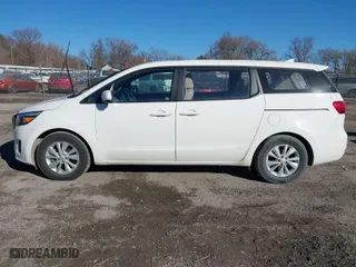 2017 Kia Sedona L with VIN KNDMA5C10H6257698, listed as a IAAI auction lot 41343330 with 141,352 mi miles. Bid and sale history available at carsss.com. Image 14.