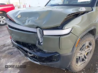 2024 Rivian R1S Launch Edition with VIN 7PDSGABL1RN035074, listed as a IAAI auction lot 41276556 with Not Provided miles. Bid and sale history available at carsss.com. Image 6.