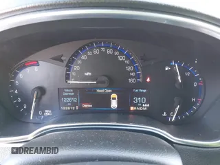 2015 Cadillac SRX with VIN 3GYFNAE30FS573125, listed as a IAAI auction lot 40972187 with 122,612 mi miles and . Bid and sale history available at DreamBid. Image 7.