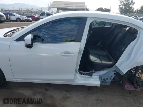 2016 Mazda 3 i Grand Touring with VIN JM1BM1X73G1346876, listed as a IAAI auction lot 40283164 with 102,264 mi miles and . Bid and sale history available at DreamBid. Image 15.