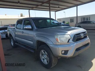 2015 Toyota Tacoma PreRunner z VIN 3TMJU4GN7FM176826, wystawiony jako IAAI lot #42444232 z przebiegiem 178 162 mil mil oraz . Historia ofert i sprzedaży dostępna na DreamBid. Obrazek 1.
