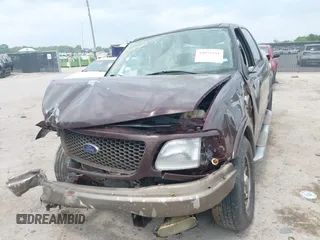 2003 Ford F-150 XLT with VIN 1FTRW07633KB16656, listed as a IAAI auction lot 42052141 with Not Provided miles. Bid and sale history available at carsss.com. Image 16.