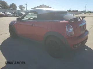 2012 MINI Coupe S z VIN WMWSX3C53CT155140, wystawiony jako Copart lot #75521054 z przebiegiem 65 628 mil mil oraz Szkody całkowita. Historia ofert i sprzedaży dostępna na DreamBid. Obrazek 2.