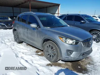 2013 Mazda CX-5 Grand Touring with VIN JM3KE4DE4D0168115, listed as a IAAI auction lot 41610004 with 190,690 mi miles. Bid and sale history available at carsss.com. Image 1.