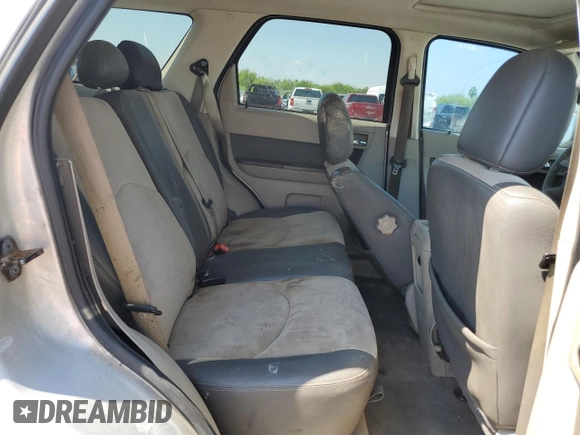 2009 Mercury Mariner Premier with VIN 4M2CU87719KJ04415, listed as a Copart auction lot 74785494 with 305,554 mi miles and Salvage Title. Bid and sale history available at carsss.com. Image 11.