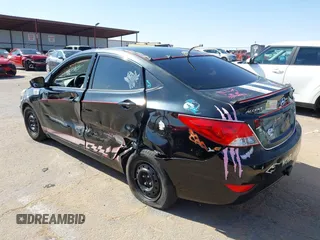 2014 Hyundai Accent GLS with VIN KMHCT4AE2EU749061, listed as a IAAI auction lot 42017566 with 93,929 mi miles. Bid and sale history available at carsss.com. Image 3.