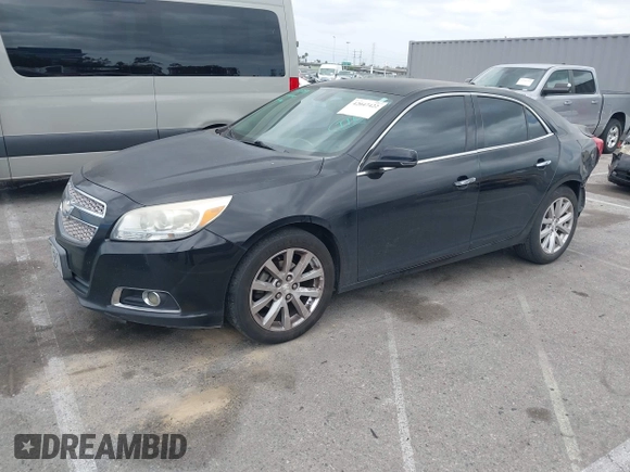 2013 Chevrolet Malibu LTZ with VIN 1G11H5SA2DU125573, listed as a IAAI auction lot 42047422 with 165,493 mi miles and . Bid and sale history available at DreamBid. Image 2.