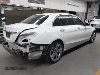 2017 Mercedes-Benz C 300 with VIN 55SWF4JB6HU221016, listed as a IAAI auction lot 42725326 with 113,432 mi miles and . Bid and sale history available at DreamBid. Image 4.
