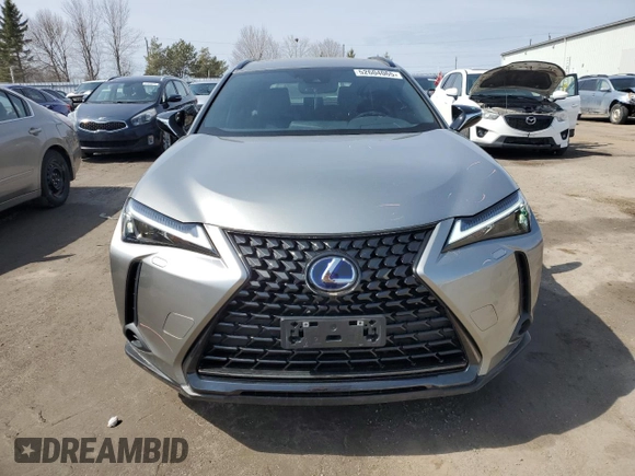 2021 Lexus UX 250h z VIN JTHP9JBH7M2048892, wystawiony jako Copart lot #52604065 z przebiegiem 46 202 mil mil oraz Czysty tytuł • Clean title. Historia ofert i sprzedaży dostępna na DreamBid. Obrazek 5.