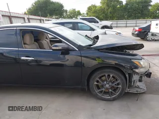 2014 Nissan Maxima SV with VIN 1N4AA5AP5EC499187, listed as a IAAI auction lot 42094212 with 196,747 mi miles and . Bid and sale history available at DreamBid. Image 18.