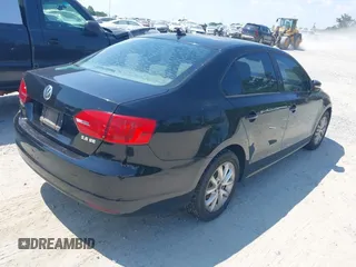 2012 Volkswagen Jetta SE with VIN 3VWDX7AJ6CM343682, listed as a IAAI auction lot 42561217 with 170,257 mi miles and . Bid and sale history available at DreamBid. Image 4.