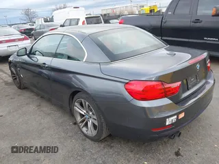 2015 BMW 4 Series 428i with VIN WBA3V7C54FP772531, listed as a IAAI auction lot 41487899 with 90,893 mi miles. Bid and sale history available at carsss.com. Image 3.