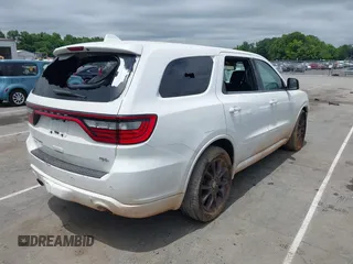 2015 Dodge Durango R/T with VIN 1C4SDJCT4FC938647, listed as a IAAI auction lot 42370175 with 179,686 mi miles and . Bid and sale history available at DreamBid. Image 4.