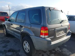 2004 Ford Escape with VIN 1FMCU02174KA61956, listed as a IAAI auction lot 41913605 with 166,587 mi miles and . Bid and sale history available at DreamBid. Image 3.
