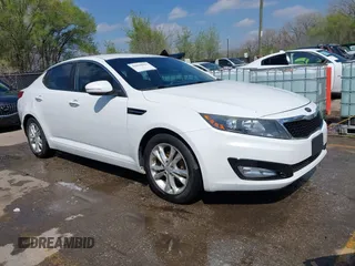 2012 Kia Optima LX z VIN 5XXGM4A70CG033380, wystawiony jako IAAI lot #42010023 z przebiegiem 188 050 mil mil oraz . Historia ofert i sprzedaży dostępna na DreamBid. Obrazek 1.