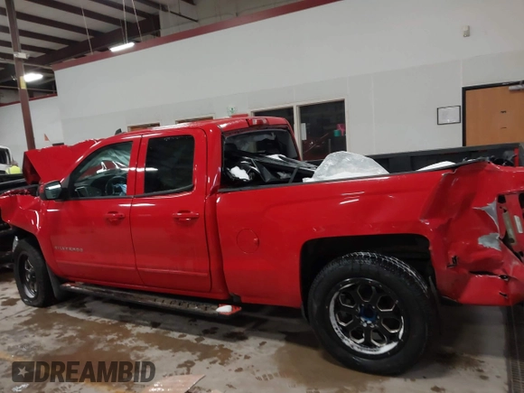 2018 Chevrolet Silverado 1500 LT with VIN 1GCRCREH4JZ164236, listed as a IAAI auction lot 41394225 with 64,639 mi miles and . Bid and sale history available at DreamBid. Image 15.