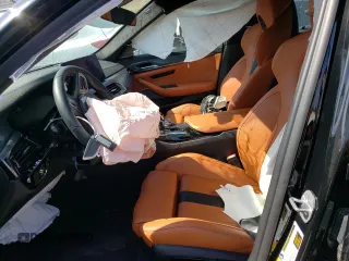 2022 BMW M5 z VIN WBS83CH01NCH75182, wystawiony jako Copart lot #46284903 z przebiegiem Nie podano mil oraz . Historia ofert i sprzedaży dostępna na DreamBid. Obrazek 7.
