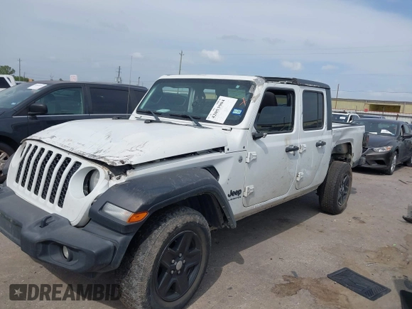 2020 Jeep Gladiator Sport S with VIN 1C6HJTAG9LL161535, listed as a IAAI auction lot 42053904 with 104,260 mi miles and . Bid and sale history available at DreamBid. Image 2.