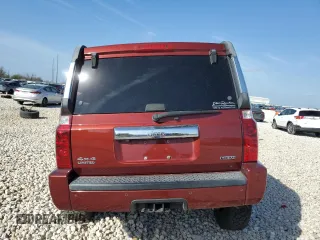 2007 Jeep Commander Limited z VIN 1J8HG58257C610852, wystawiony jako Copart lot #49461225 z przebiegiem 91 125 mil mil oraz Szkoda całkowita • Salvage title. Historia ofert i sprzedaży dostępna na DreamBid. Obrazek 6.