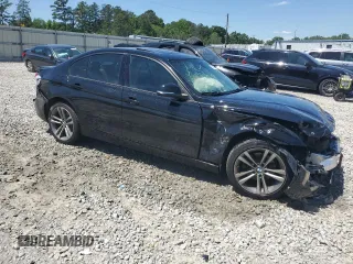 2018 BMW 3 Series 330i xDrive with VIN WBA8D9C54JEM35107, listed as a Copart auction lot 55878485 with 65,211 mi miles and Salvage title. Bid and sale history available at DreamBid. Image 4.