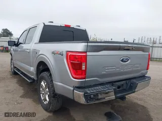 2021 Ford F-150 XL with VIN 1FTFW1E85MKD41725, listed as a IAAI auction lot 41631794 with 52,049 mi miles. Bid and sale history available at carsss.com. Image 3.