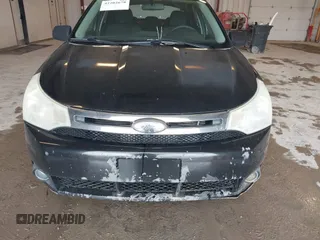 2009 Ford Focus SE with VIN 1FAHP35N69W128084, listed as a IAAI auction lot 42202678 with 290,358 mi miles. Bid and sale history available at carsss.com. Image 6.