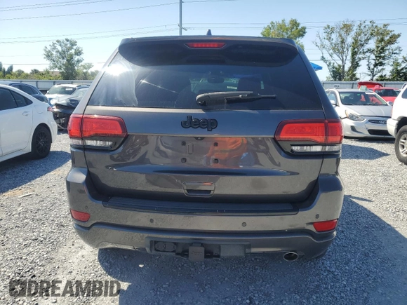 2017 Jeep Grand Cherokee 75th Anniversary with VIN 1C4RJEAG4HC700191, listed as a Copart auction lot 52520655 with 130,828 mi miles and Salvage title. Bid and sale history available at DreamBid. Image 6.