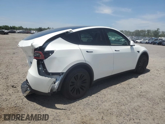 2022 Tesla Model Y Long Range z VIN 7SAYGDEE9NF455614, wystawiony jako Copart lot #57612985 z przebiegiem 22 101 mil mil oraz Szkoda całkowita • Salvage title. Historia ofert i sprzedaży dostępna na DreamBid. Obrazek 3.