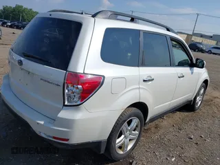 2009 Subaru Forester X with VIN JF2SH63639H791581, listed as a IAAI auction lot 42754561 with 99,938 mi miles and . Bid and sale history available at DreamBid. Image 4.