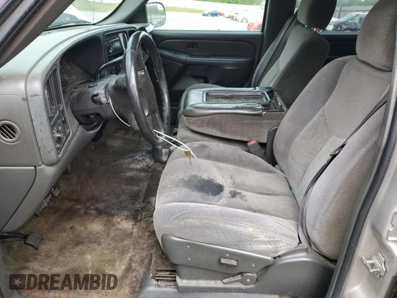 2005 Chevrolet Silverado 1500 LS with VIN 2GCEC13T251369558, listed as a Copart auction lot 52897375 with 312,210 mi miles and Salvage Title. Bid and sale history available at DreamBid. Image 7.