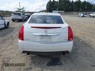 2013 Cadillac CTS Premium z VIN 1G6DS5E3XD0106332, wystawiony jako IAAI lot #42152577 z przebiegiem 114 700 mil mil oraz . Historia ofert i sprzedaży dostępna na DreamBid. Obrazek 16.