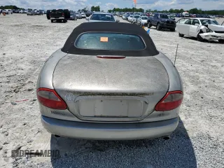 1999 Jaguar XK z VIN SAJGX2049XC034022, wystawiony jako Copart lot #55690025 z przebiegiem Nie podano mil oraz Tytuł czysty. Historia ofert i sprzedaży dostępna na DreamBid. Obrazek 6.