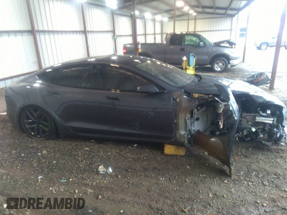 2022 Tesla Model S with VIN 5YJSA1E57NF484158, listed as a IAAI auction lot 41531574 with 16,079 mi miles and . Bid and sale history available at DreamBid. Image 13.