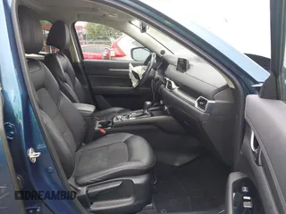 2017 Mazda CX-5 Touring z VIN JM3KFBCL9H0224962, wystawiony jako IAAI lot #42312104 z przebiegiem Nie podano mil oraz . Historia ofert i sprzedaży dostępna na DreamBid. Obrazek 5.