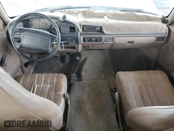 1996 Ford Bronco XL z VIN 1FMEU15N0TLB63427, wystawiony jako Copart lot #82779084 z przebiegiem 175 679 mil mil oraz Szkoda całkowita • Salvage title. Historia ofert i sprzedaży dostępna na DreamBid. Obrazek 8.