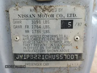 1987 Nissan Sentra z VIN JN1PB2210HU557007, wystawiony jako Copart lot #68174784 z przebiegiem 150 316 mil mil oraz Tytuł czysty. Historia ofert i sprzedaży dostępna na DreamBid. Obrazek 12.