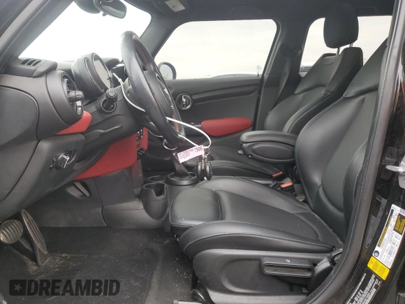 2017 MINI Hardtop 4 Door Cooper with VIN WMWXU1C30H2E19304, listed as a Copart auction lot 51008575 with 34,526 mi miles and Salvage Title. Bid and sale history available at DreamBid. Image 7.