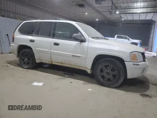 2003 GMC Envoy SLE z VIN 1GKDT13S632156357, wystawiony jako Copart lot #41398035 z przebiegiem 160 338 mil mil oraz Szkoda całkowita • Salvage title. Historia ofert i sprzedaży dostępna na DreamBid. Obrazek 4.