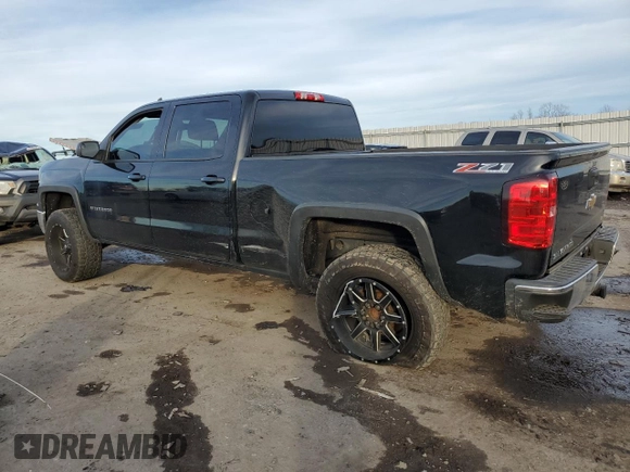 2015 Chevrolet Silverado 1500 LT with VIN 3GCUKREC9FG142578, listed as a Copart auction lot 44142905 with 194,369 mi miles and Salvage Title. Bid and sale history available at DreamBid. Image 2.