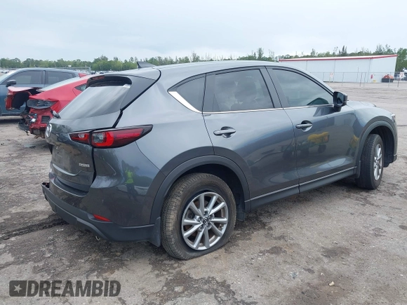 2023 Mazda CX-5 2.5 S Select Package with VIN JM3KFBBM3P0289296, listed as a IAAI auction lot 41676427 with 15,709 mi miles. Bid and sale history available at carsss.com. Image 4.