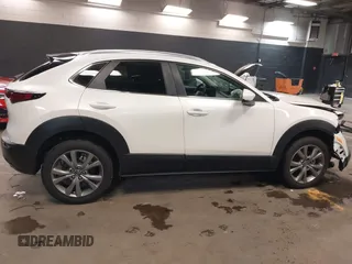 2024 Mazda CX-30 S Carbon Edition z VIN 3MVDMBCM4RM657165, wystawiony jako IAAI lot #42297738 z przebiegiem 7 041 mil mil oraz . Historia ofert i sprzedaży dostępna na DreamBid. Obrazek 14.
