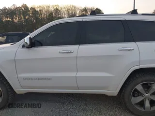 2015 Jeep Grand Cherokee High Altitude with VIN 1C4RJECG8FC175565, listed as a IAAI auction lot 41733248 with 107,947 mi miles. Bid and sale history available at carsss.com. Image 15.
